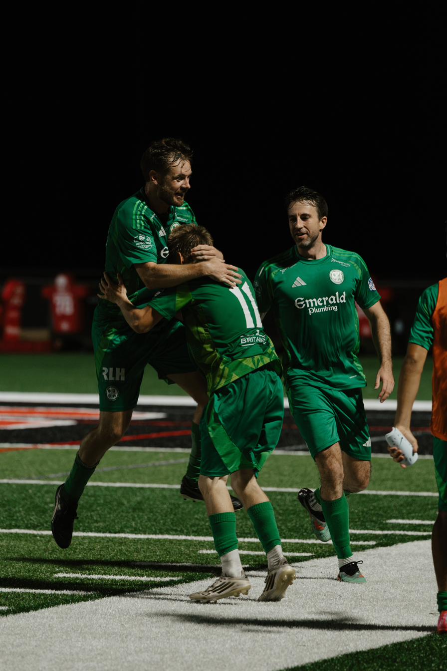 Celebrating a goal under the lights