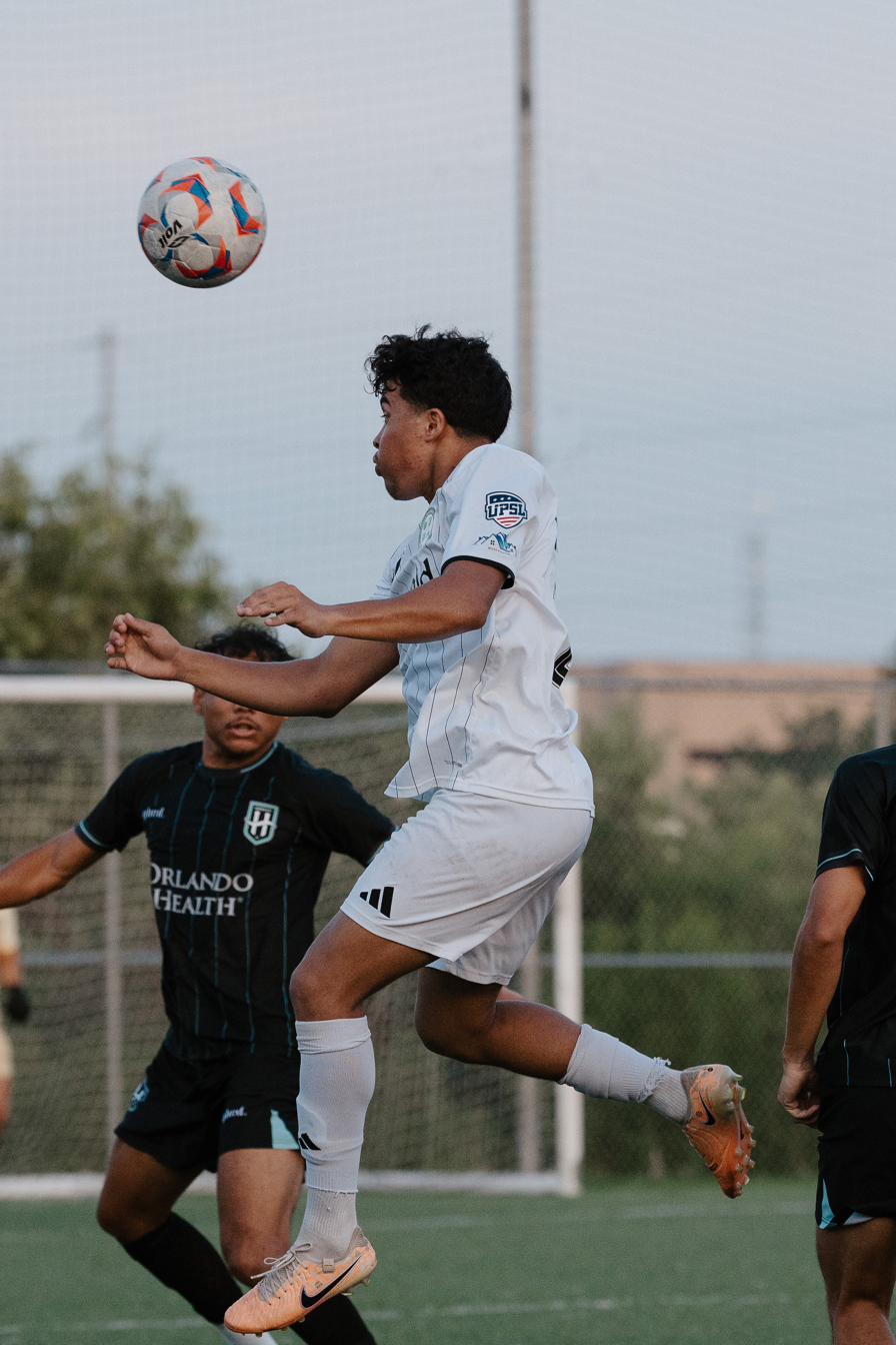 Emerald FC winning a header