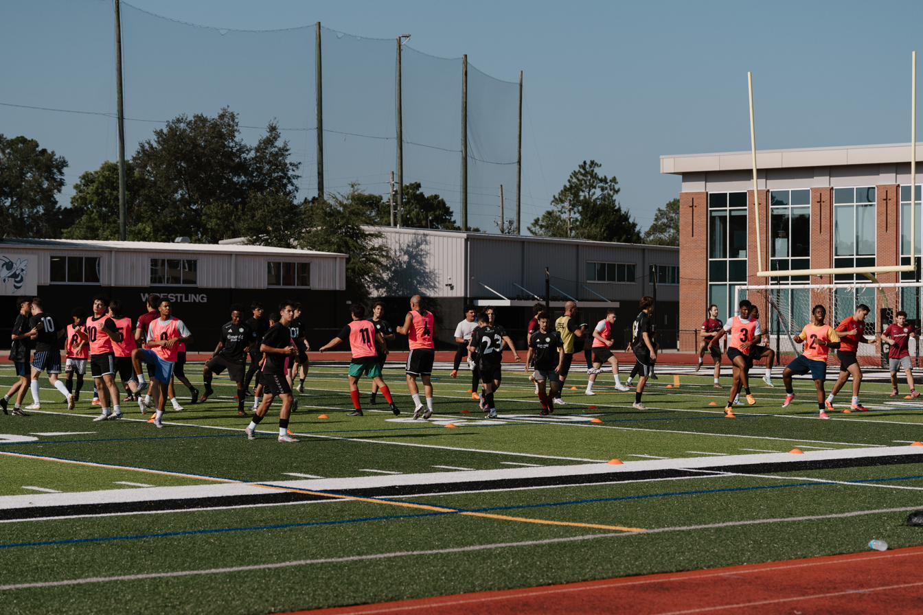 Players warming up at the Emerald FC open tryout