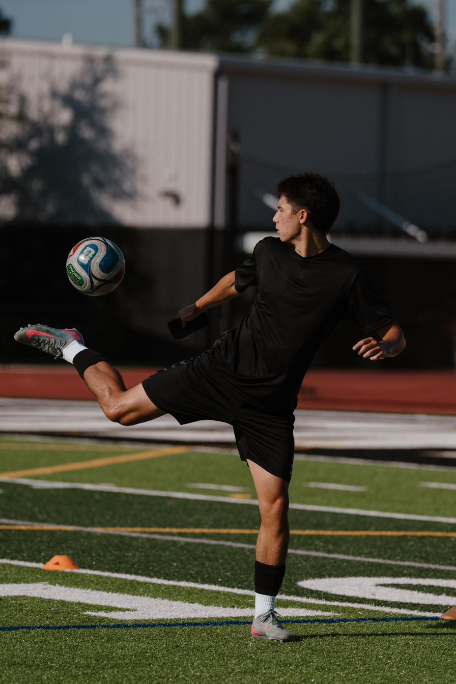 Tryout player striking the ball